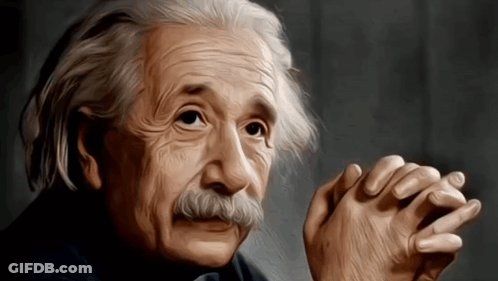 Albert Einstein With Hands Folded In Front Of Face GIF