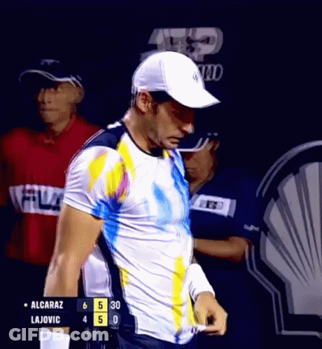 Alcaraz Lajovic Standing In Front Of Scoreboard GIF