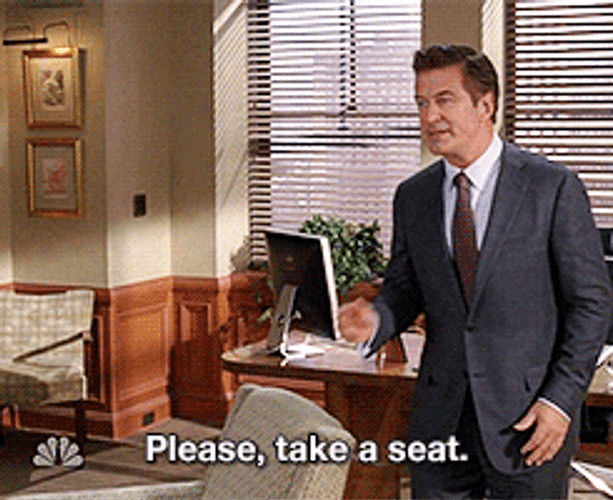 Alec Baldwin Take A Seat GIF