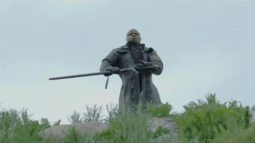 Alex Boye Sheathing Sword Battle GIF