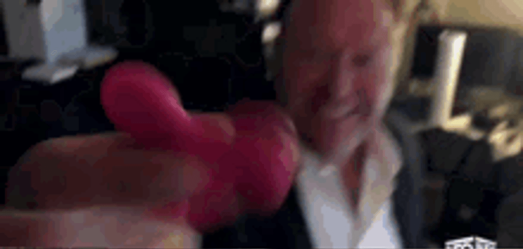 Alex Jones Happy Playing Fidget Spinner GIF