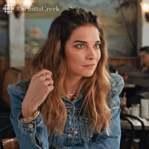 Alexis Rose Eagerly Listening GIF