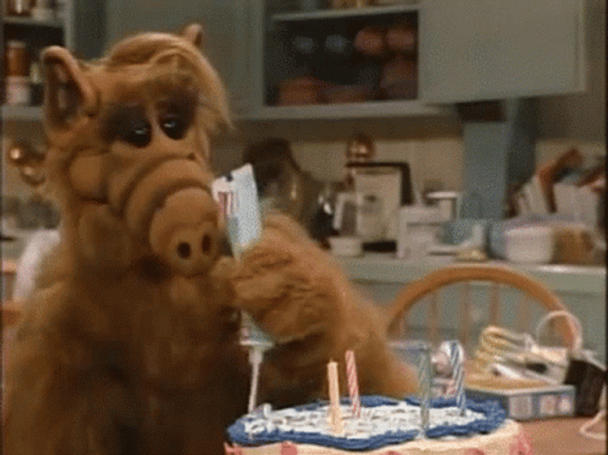 Alf Squeezing Toothpaste On Cake GIF