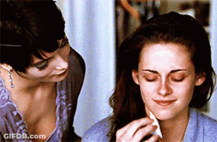 Alice Cullen Puts Make Up On Bella Swan GIF