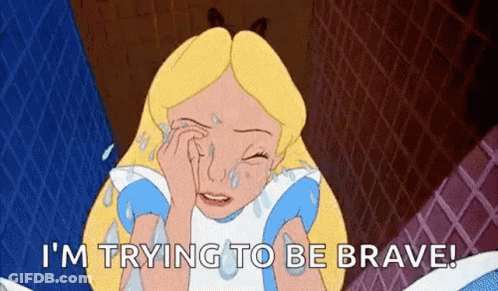 Alice From Alice In Wonderland Is Crying With Tears Running Down Her Face . GIF