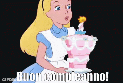 Alice In Wonderland Blowing Out Candle On Cake GIF