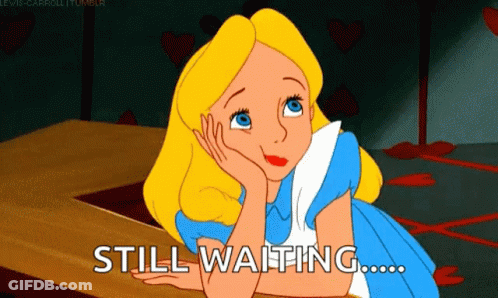 Alice In Wonderland Laying On Table Still Waiting GIF