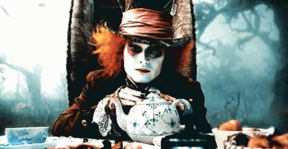 Alice In Wonderland Mad Hatter Looking GIF