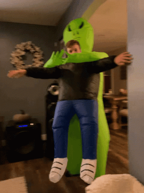 Alien Abduction Inflatable Man GIF