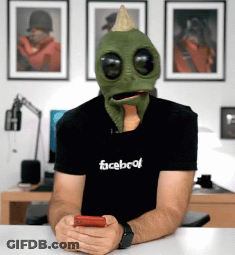 Alien Ironing Womans Clothes In Kitchen With Sudz Cleaner GIF