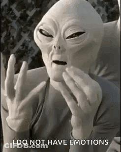 Alien Sitting On Couch Making Funny Face GIF
