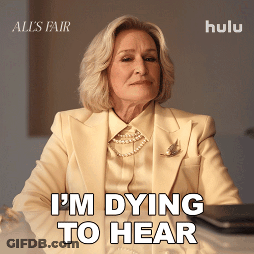 All's Fair Poster Woman In White Suit GIF