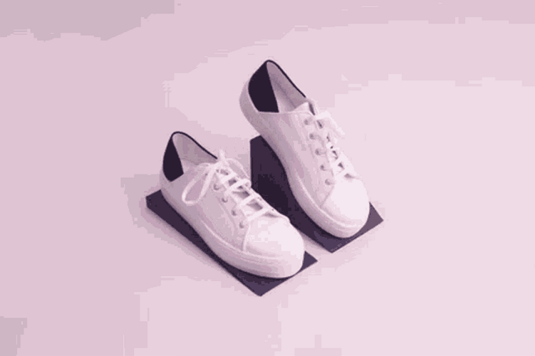 Alternately Elevating White Shoes GIF
