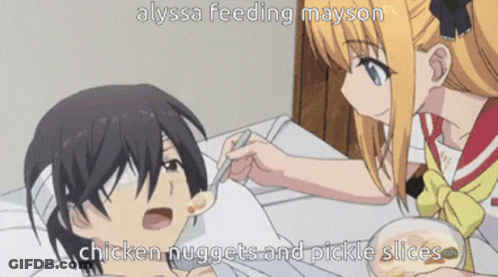 Alyssa Feeding Mayson Chicken Nuggets And Pickle Slices With Spoon GIF