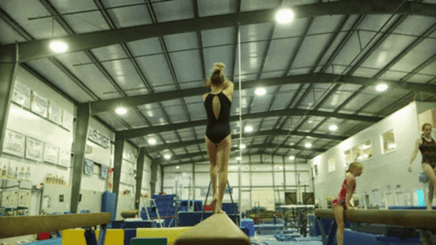 Amazing Kid Tiptoeing In Balance Beam GIF