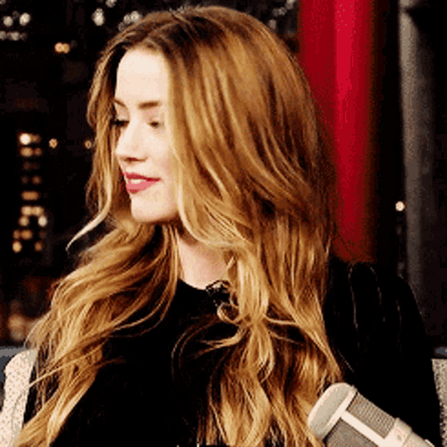 Amber Heard Charmingly Smiling GIF