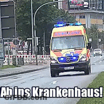 Ambulance Driving Down Street Ab Ins Krankenhaus GIF