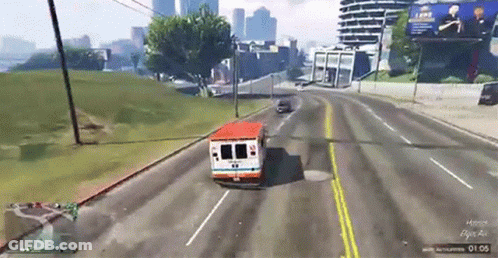Ambulance Driving Down Street In Video Game At 01:55 GIF