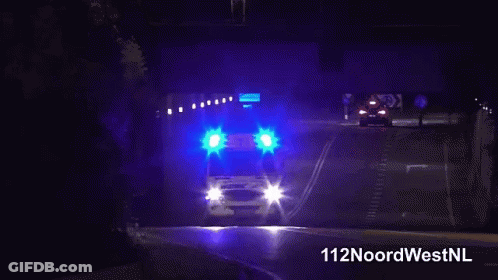 Ambulance Parked On Side Of Road GIF