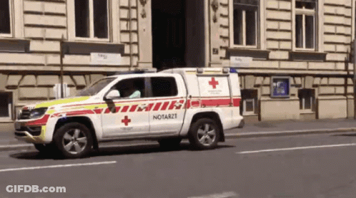Ambulance With XJL 482 License Plate GIF