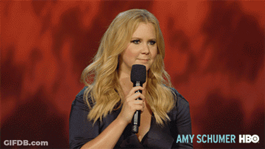 American Comedian Amy Schumer Awkward Smile GIF