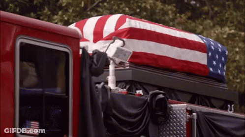 American Flag Draped Over Coffin GIF