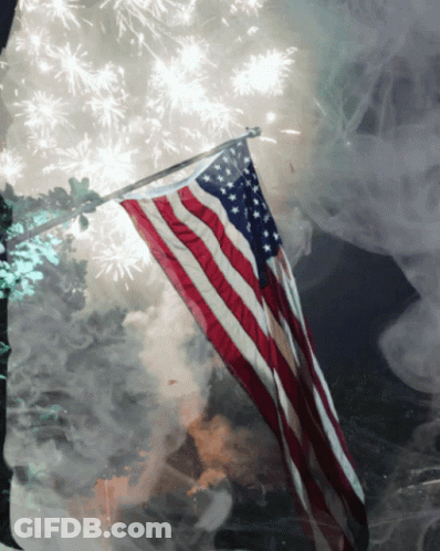 American Flag Flying Fireworks Display GIF