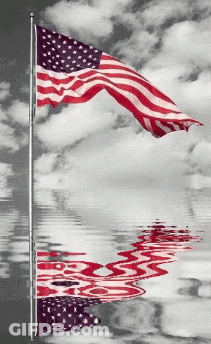 American Flag Reflected In Water With Clouds GIF