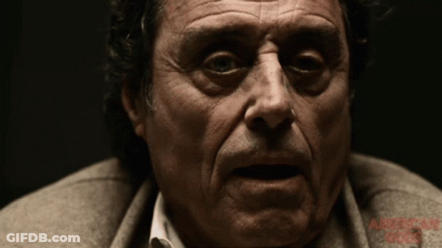 American Gods Mr Wednesday Looking Sideways GIF