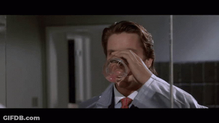 American Psycho Christian Bale Drinking Walking Away GIF