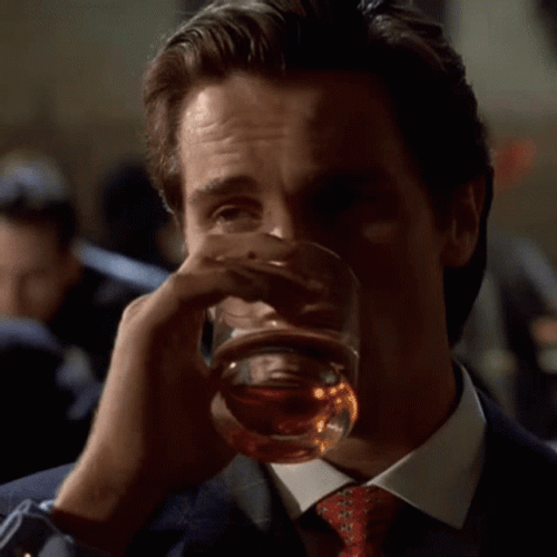 American Psycho Patrick Bateman Drinks Rum GIF