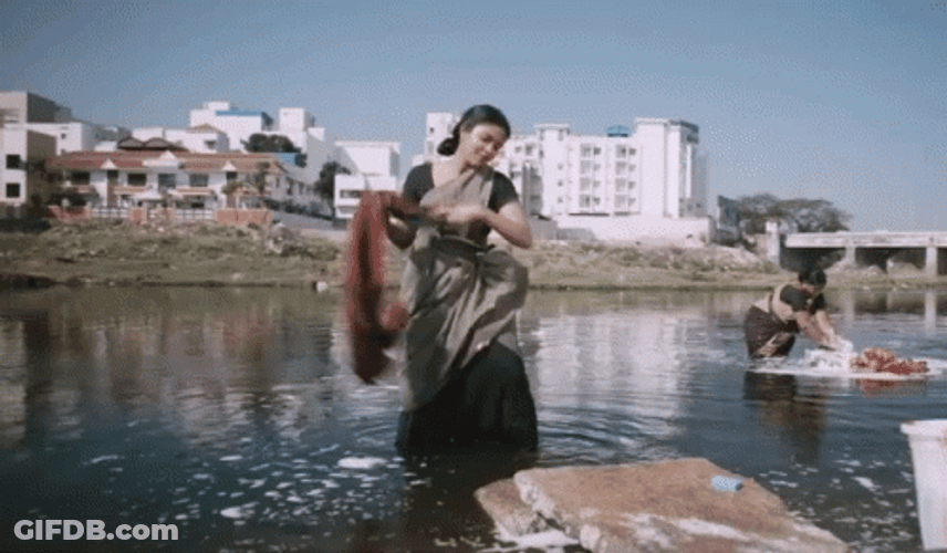 Amma Kanakku Doing Laundry In The River GIF