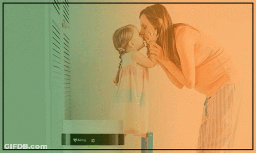 An Ad For An Air Purifier For Smoke Shows A Woman And Child Kissing GIF