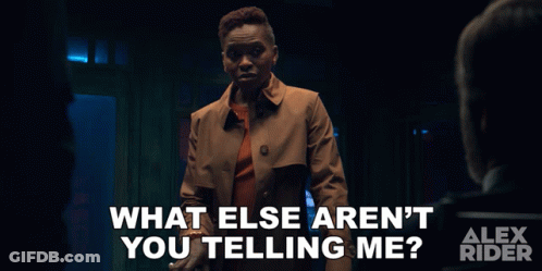 An Advertisement For Alex Rider Shows A Woman In A Trench Coat Talking To A Man GIF