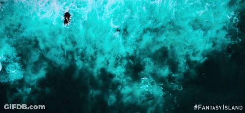 An Advertisement For Fantasy Island Shows A Person Swimming In The Water GIF