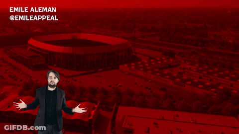 An Advertisement For Robin Van Persie With A Man In Front Of A Large Stadium GIF