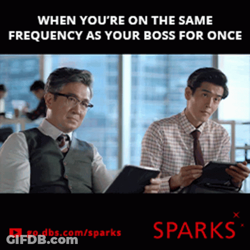 An Advertisement For Sparks Shows Two Men Looking At Their Phones GIF