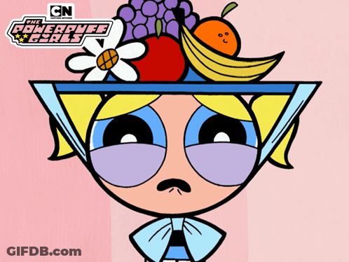An Advertisement For The Powerpuff Girls Shows A Girl With A Bowl Of Fruit On Her Head GIF