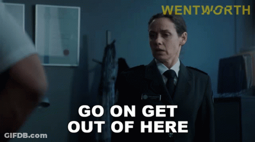 An Advertisement For Wentworth Shows A Woman In Uniform Talking To A Man GIF
