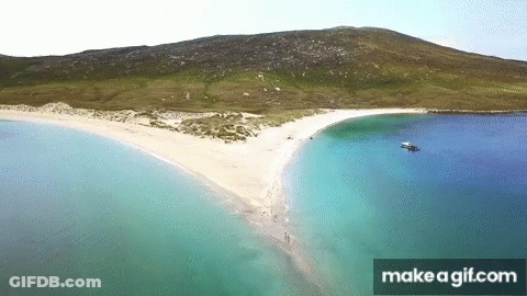An Aerial View Of A Beach With A Make A Gif.com Button GIF
