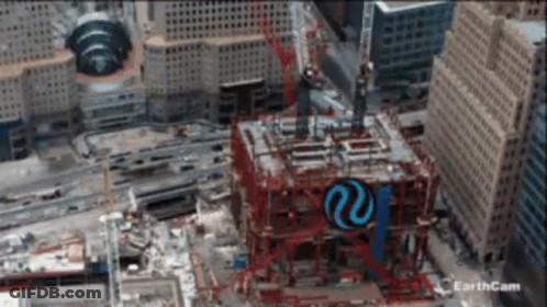 An Aerial View Of A Building Under Construction With The Earthcam Logo On The Bottom Right GIF