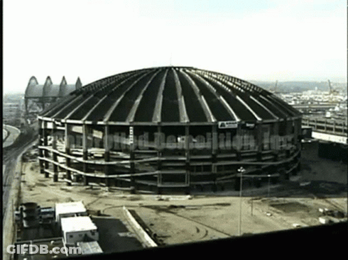 An Aerial View Of A Building Under Construction With The Words Demolition In The Upper Right Corner GIF