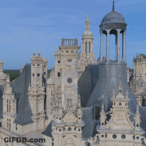 An Aerial View Of A Castle With A Tower That Looks Like A Clock Tower GIF
