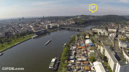 An Aerial View Of A City And A River With A Yellow Speech Bubble That Says ' I ' On It GIF