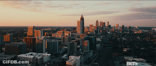 An Aerial View Of A City With A Bet Logo On The Bottom Right GIF