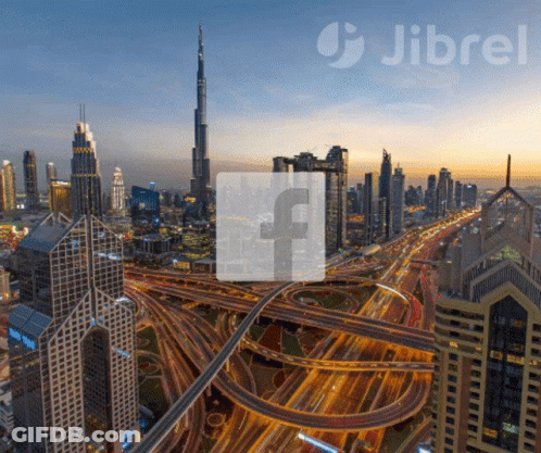 An Aerial View Of A City With A Facebook Logo GIF