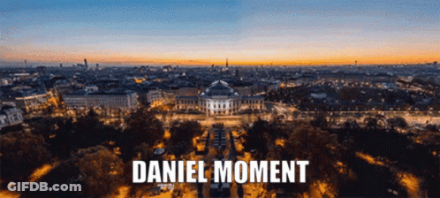 An Aerial View Of A City With Daniel Moment Written On The Top GIF