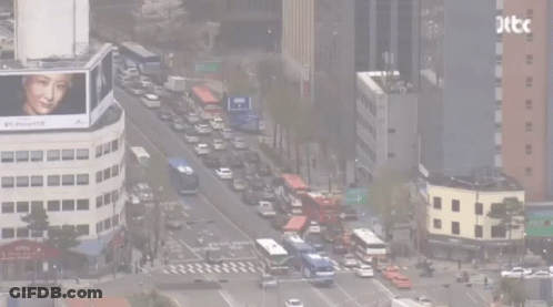 An Aerial View Of A City With The Letters Jtb Visible GIF