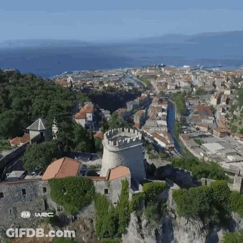 An Aerial View Of A City With The Words Fia W2c On The Bottom Right GIF
