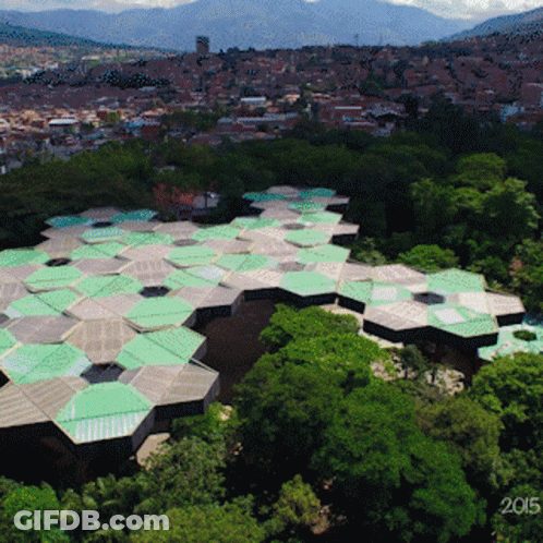An Aerial View Of A City With The Year 2015 GIF
